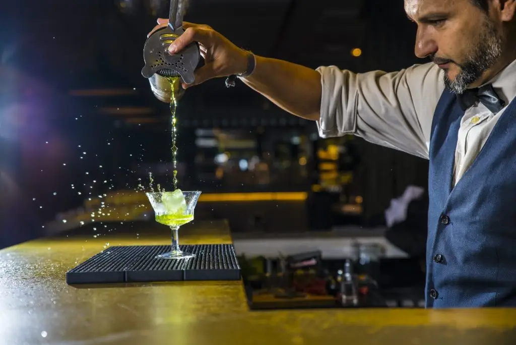 A bartender pouring a drink at Wine at Metropolitan School of Bartending - Course - Sign up