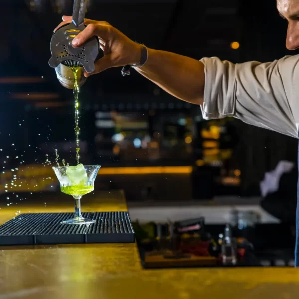 A bartender pouring a drink at Wine at Metropolitan School of Bartending - Course - Sign up